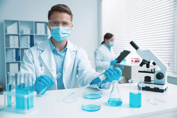 Medical analysis. Scientist working with sample in laboratory, selective focus