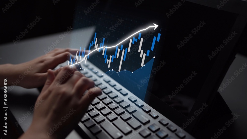 Poster a close-up of hands typing on a laptop keyboard with a glowing financial graph projected on the scre