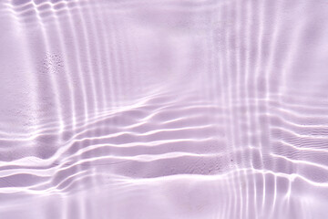 Fototapeta premium Abstract purple water background with streaks of water.