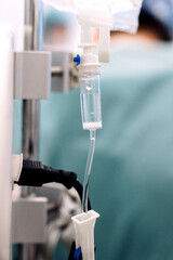 Medical IV drip system with clear fluid flowing through transparent tubing, showcasing essential...