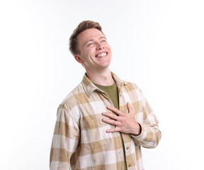 Handsome man laughing on white background. Positive emotion