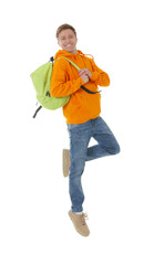 Portrait of happy young man with backpack jumping on white background