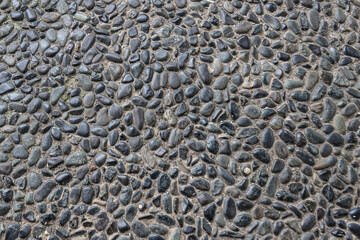 A layer of gravel formed into a floor.