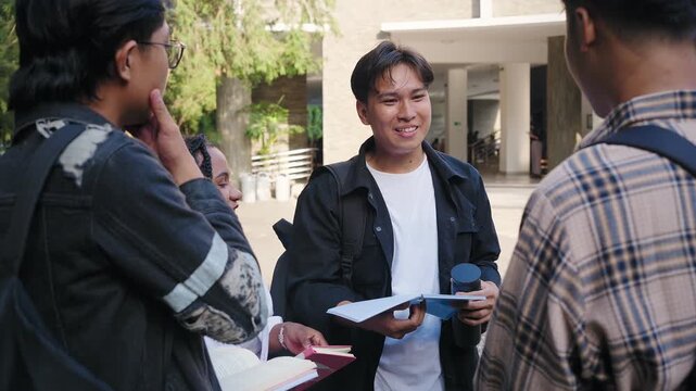 School group of diverse Asian student friends talking and bonding outdoors after class