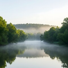 Obraz premium A misty river scene with lush green trees reflected in the calm water, evoking a sense of tranquility