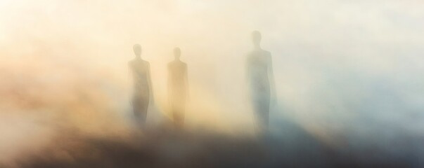 Silhouette figures in a hazy, ethereal landscape.