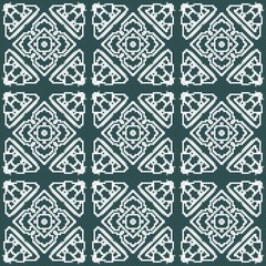 Elegant seamless pattern design with intricate floral elements for fabric or wallpaper projects