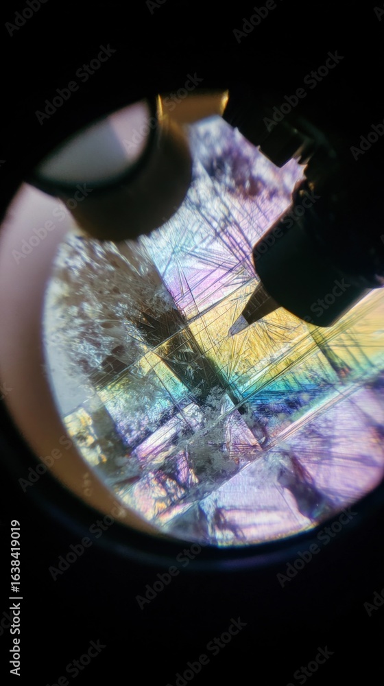Poster microscope showing colorful crystal structure with polarization