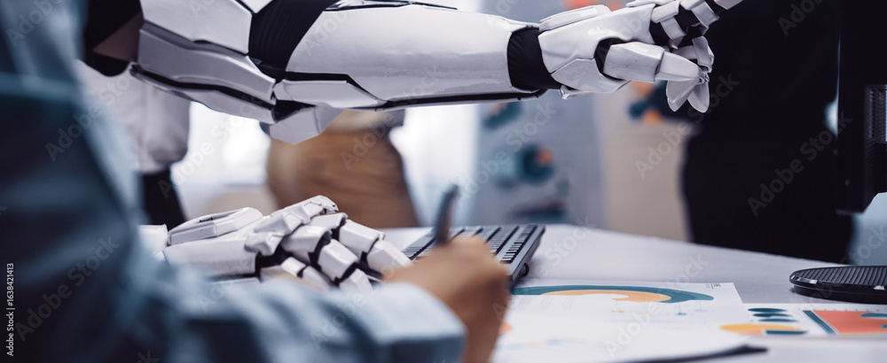 Poster robotic arm assisting human worker in office environment with data visualizations and digital charts