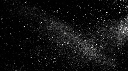 A black background speckled with numerous small, bright white particles, concentrated in a diagonal streak