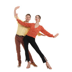 Happy couple in retro outfits dancing on white background