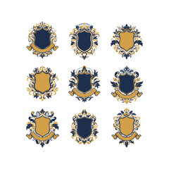 Nine Elegant Gold and Blue Heraldic Crest Designs with Flourishes and Ribbons