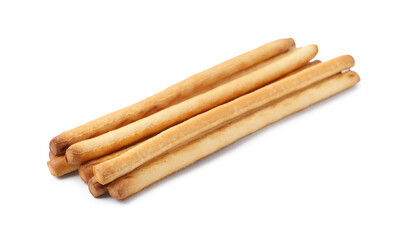 Many delicious grissini sticks isolated on white