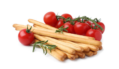 Delicious grissini sticks with fresh tomatoes and rosemary isolated on white