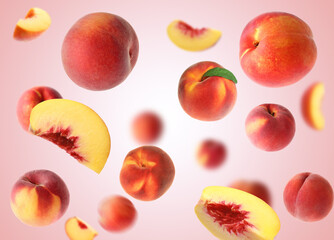 Fresh peaches whirling in air against pink gradient background