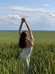 young woman in field
