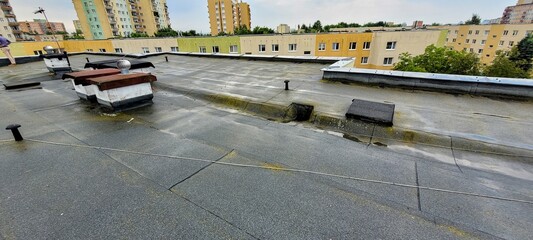 Rooftop View with Rain Urban Landscape, showcasing the intersection of nature and architecture