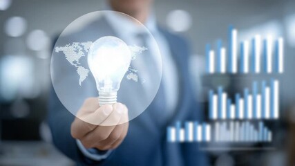A businessman in a tailored suit holds a glowing light bulb with a holographic world map, surrounded by digital charts in a modern office, symbolizing innovation. - Powered by Adobe