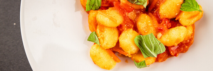 Gnocchi tomato sauce fresh delicious gourmet food background on the table  rustic food top view copy space