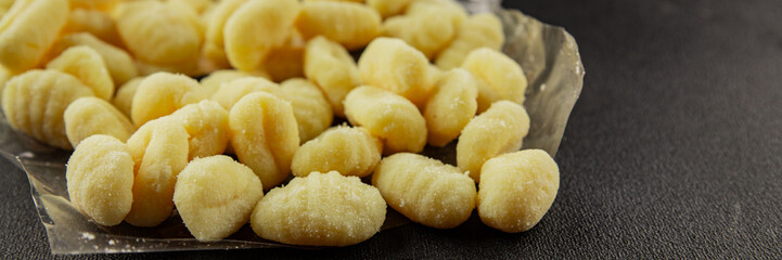 Gnocchi raw potato dough snack fresh delicious gourmet food background on the table  rustic food top view copy space vegetarian food
