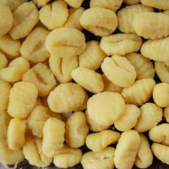 Gnocchi raw potato dough snack fresh delicious gourmet food background on the table  rustic food top view copy space vegetarian food