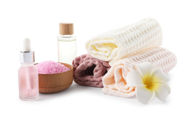 Spa composition with waffle towels and cosmetic products isolated on white