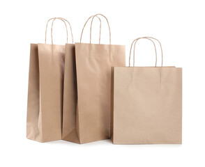 Three kraft paper bags isolated on white