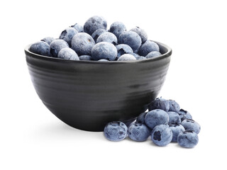 Many frozen blueberries in bowl isolated on white