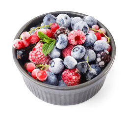 Many different frozen berries and mint in isolated on white