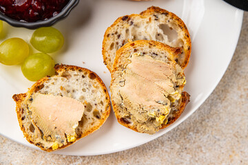 Foie gras goose liver appetizer delicacy fresh delicious gourmet food background on the table rustic food top view copy space © Alesia Berlezova