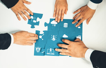 A dynamic scene showcasing multiple hands collaborating on a puzzle reflecting computing concepts,...