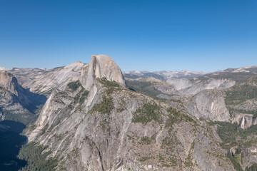 Batholith. Half Dome Granodiorite (Cretaceous). Glacier Point, Yosemite National Park, California. Sierra Nevada. Erosion and weathering. Yosemite Valley is a glacial valley. Nevada Fall
