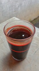 Strong black coffee, a loyal friend at dusk.