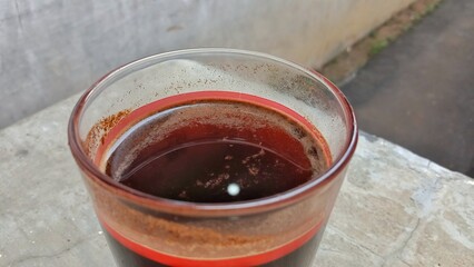 A cup of warm black coffee in the morning