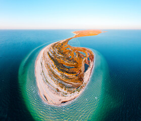 Gorgeous bird`s eye view of a curvy seacoast. Location place National park Dzharylhach, Black Sea,...