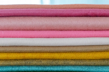 Colorful felt fabric stacks — soft textile texture backgrounds and palette