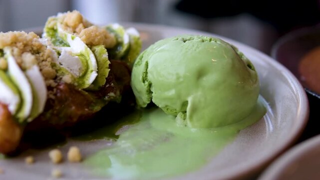 ice cream matcho green waffles cream Eating a slice dessert with a fork. High quality 4k footage