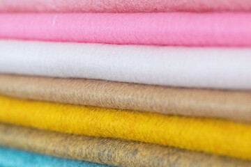 Colorful felt fabric stacks — soft textile texture backgrounds and palette