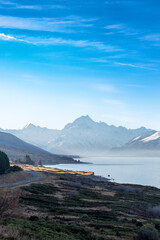 Aerial view of the highway to Mt. Cook along Lake Pukaki in South Island of New Zealand on a clear day