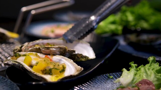 cheese sauce for oysters halal rice noodle shop in Nanning, Guangxi, China is busy cooking rice noodles. High quality 4k footage