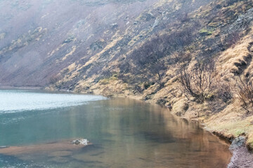 Kerid crater in Iceland on rainy April day.
