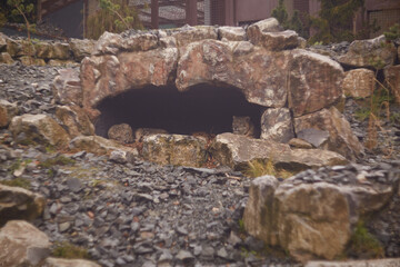 A breathtaking Stone Archway and Grand Entrance set amidst a captivating natural landscape