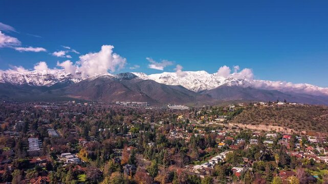 Hyperlapse of Snowy Andes Mountains with Moving Clouds in Las Condes, Santiago, Chile