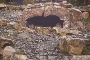 A breathtaking Stone Archway and Grand Entrance set amidst a captivating natural landscape