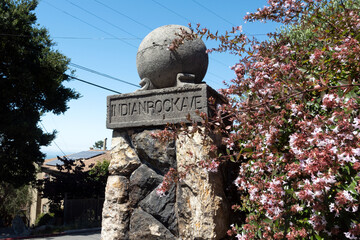 Historic stone pillar marking Indian Rock Avenue in Berkeley, California, serving as a unique street sign and local landmark near Indian Rock Park.