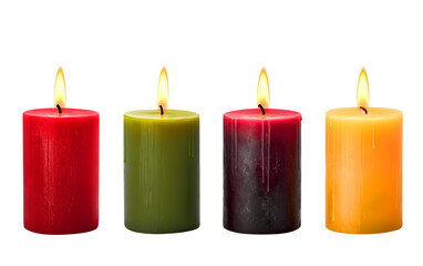 Four lit candles in various colors against a white background