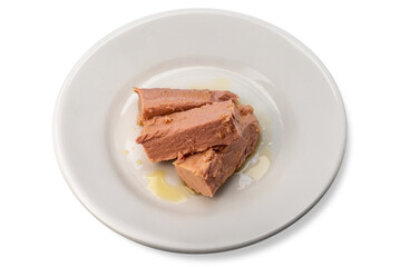 Tuna fillets in oil on a white plate isolated