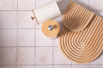 kitchen boards, storage jars. beige kitchen tile background