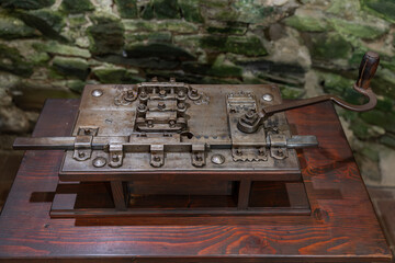A demonstration of a medieval lock mechanism made of wrought iron.
