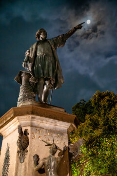 statue of Christopher Columbus touching the moon at night in the colonial sguare in the colonial district, santo domingo, dominican republic 